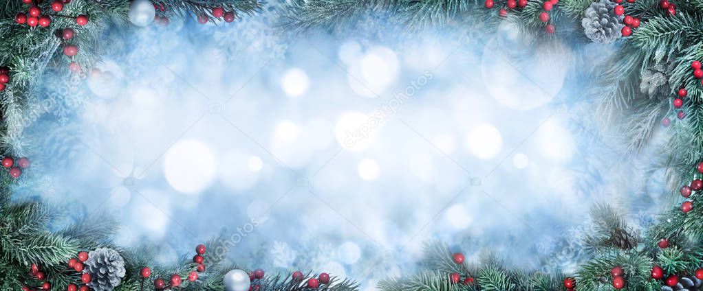 Christmas fir branches and bokeh background