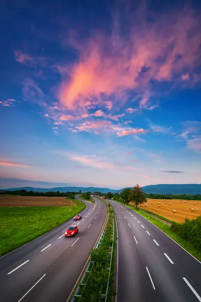 Wide Almost Empty Road Colorful Sky Sunset Beautiful Red Clouds — Stock Photo, Image