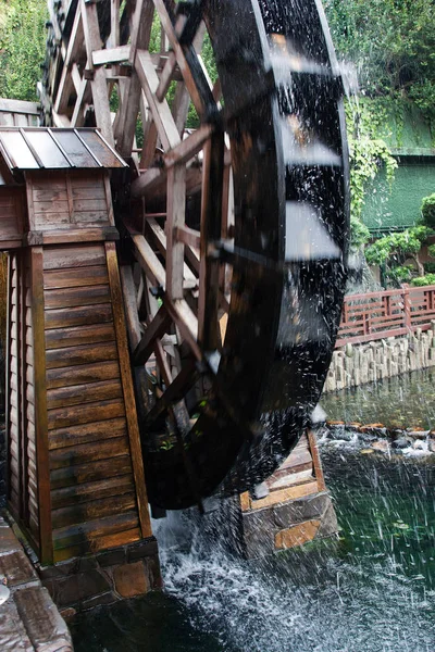 Wheel of the water mill in Hong Kong garden