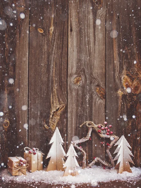 Christmas decoration over wooden background — Stock Photo, Image