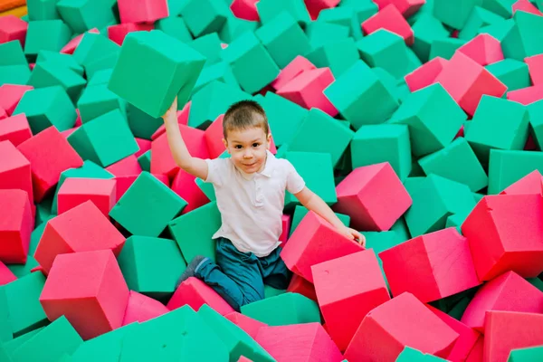 Boy playing in a dry pool — Stock Photo, Image