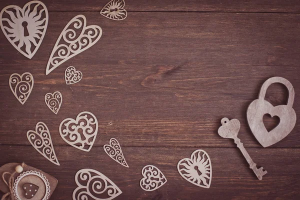 Hearts on a wooden background
