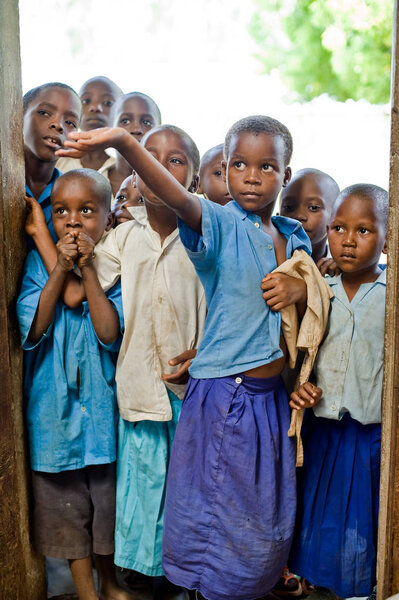 kenya. January 9, 2012. African children ask for food