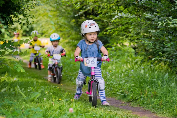 Russia. Moscow. Vorontsovsky Park on the 21st of August. STRIDER CUB 2016. Racing on the balance bike — Stock Photo, Image