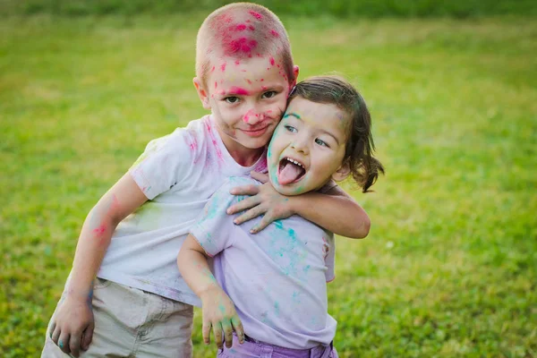 Children are stained with paint holi — Stock Photo, Image