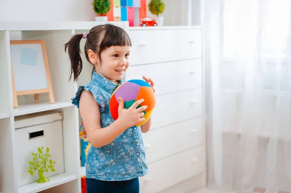 Children Little Girl Play Children Game Room Throwing Ball Concept — Stock Photo, Image