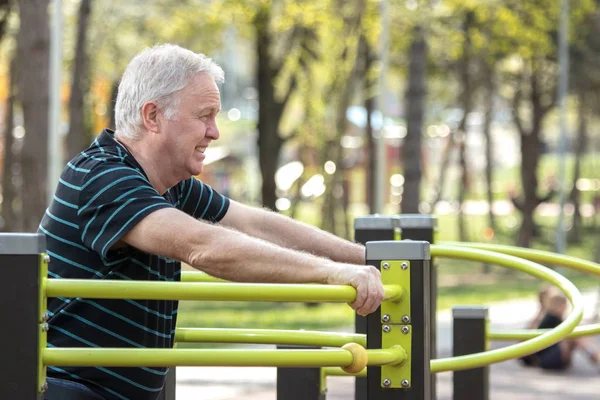 Old man tired after exercising