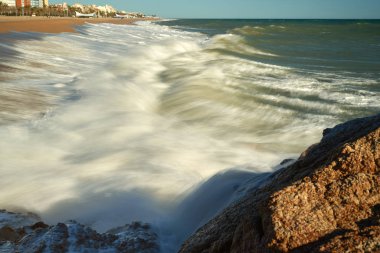 Waves sea coast beach storm.