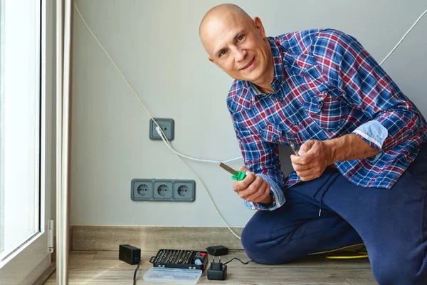 Electrician Installing Socket In House. — Stock Photo, Image