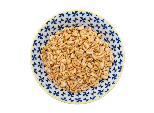 Puffed wheat in the bowl — Stock Photo, Image