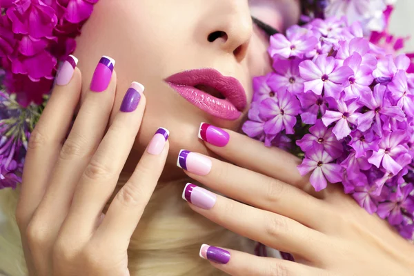 Manicure and makeup with phloxes. — Stock Photo, Image