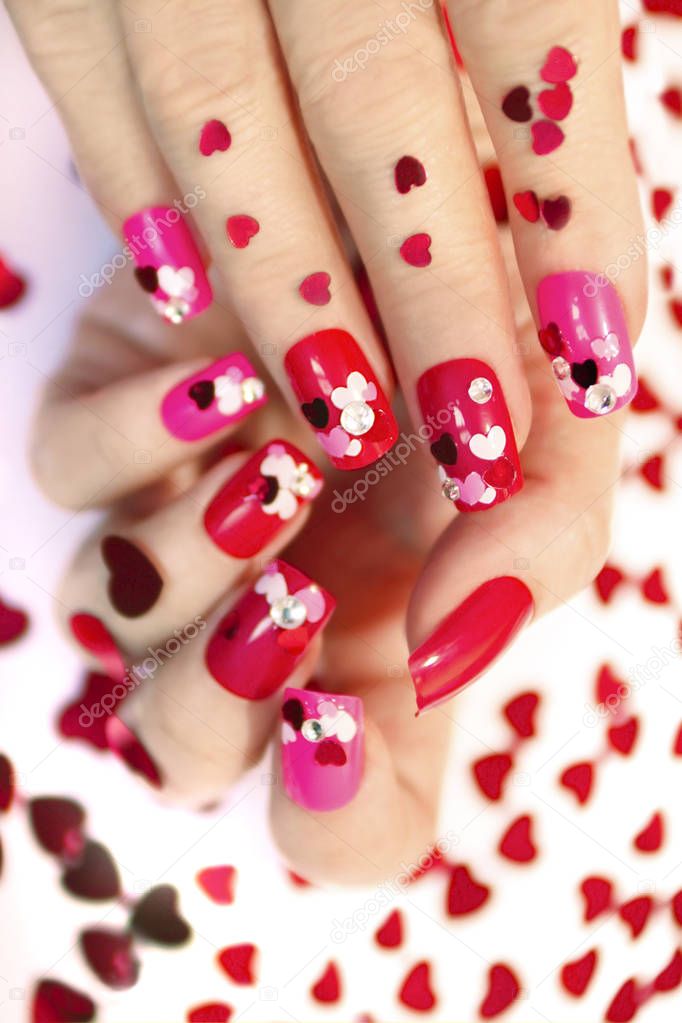 Nail designs with  hearts.