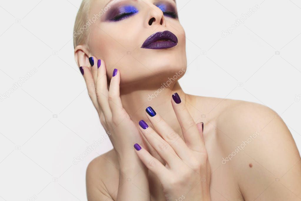 Blue purple fashion multicolored manicure and makeup .