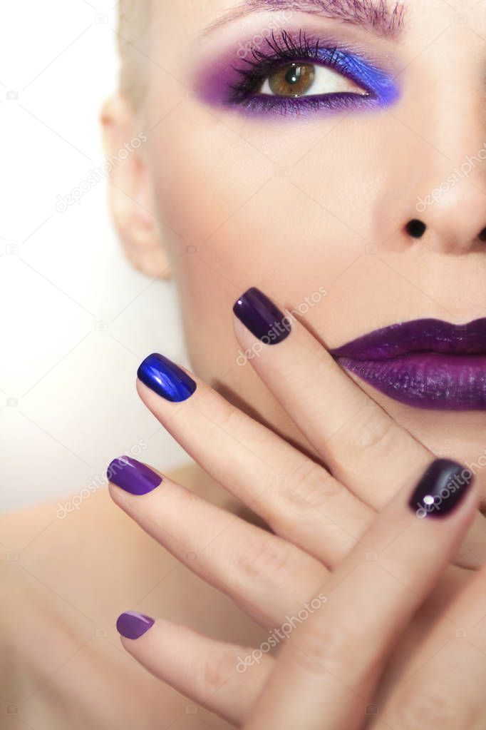 Blue purple fashion multicolored manicure and makeup.