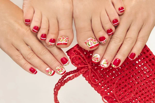 Red French manicure and pedicure. — Stock Photo, Image