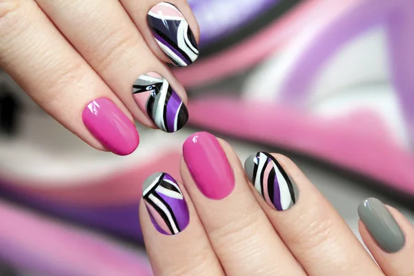 Trendy pink purple nail Polish .
