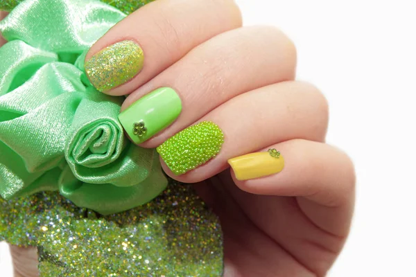 Pastel green manicure.