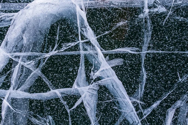 Texture de glace de fée bleue du lac Baïkal avec fissures et éclaboussures . — Photo