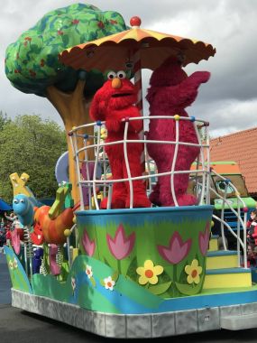 Neighborhood Street Party Parade at Sesame Place in Langhorne, Pennsylvania clipart