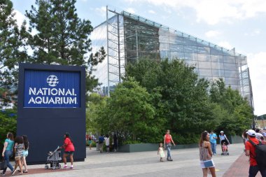 BALTIMORE, MARYLAND - JUL 2: The National Aquarium at the Inner Harbor in Baltimore, Maryland, as seen on July 2, 2017. clipart