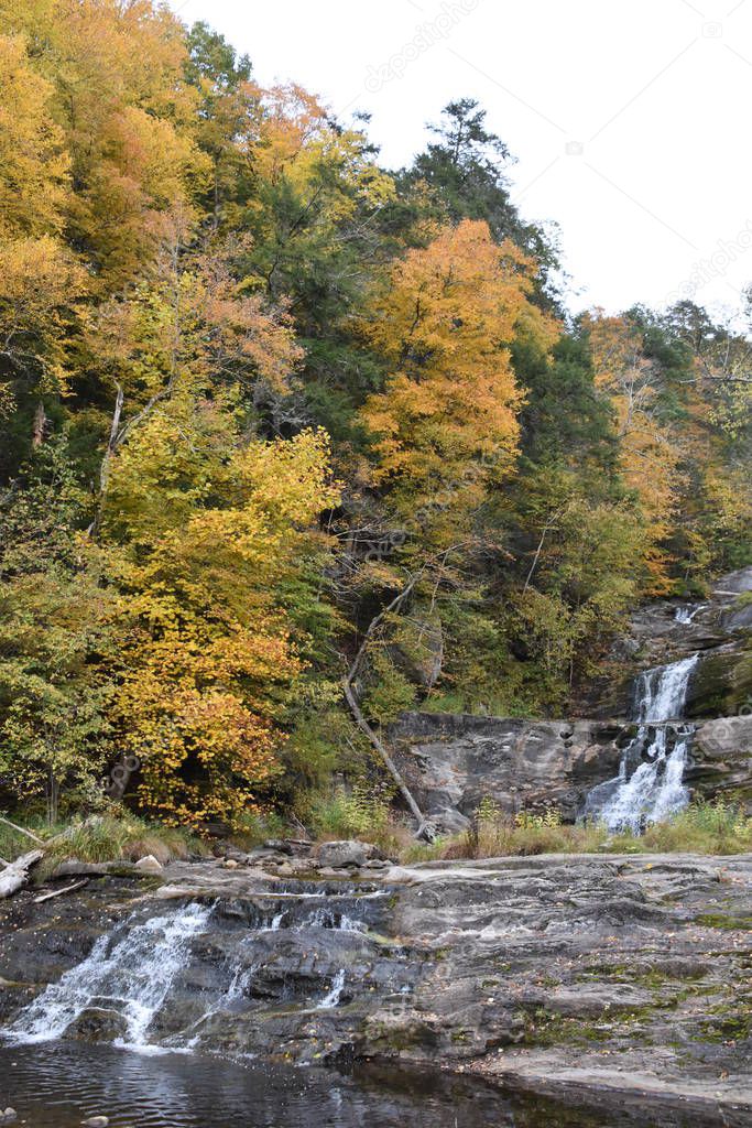 KENT, CT - OCT 13: Kent Falls State Park in Kent, Connecticut, as seen on Oct 13, 2019. The falls drop 250 feet in under a quarter mile.