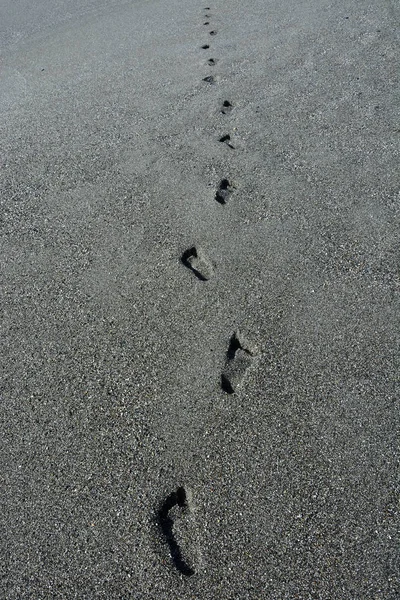 Footprints at the sand — Stock Photo, Image