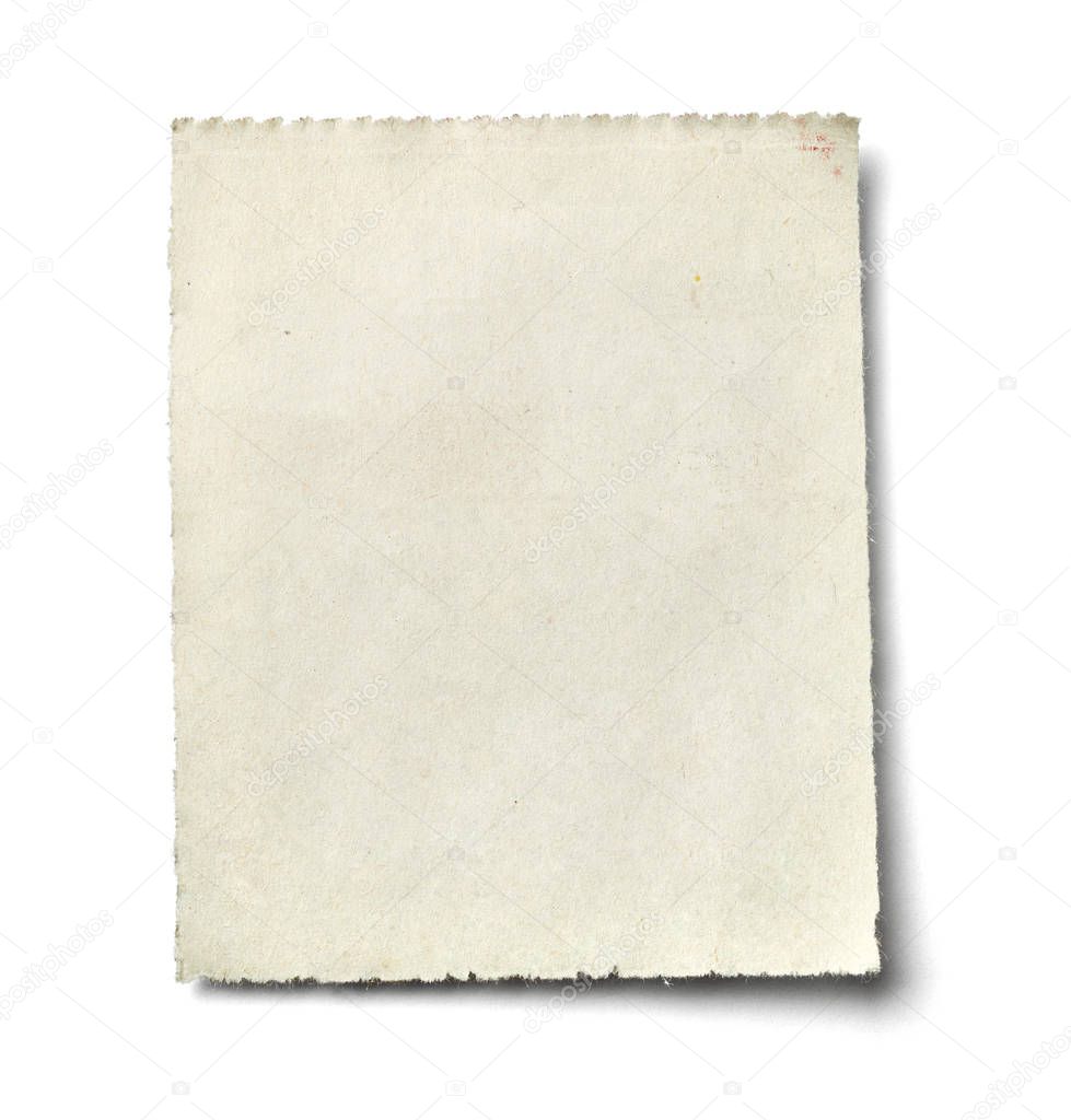 close up of piece of news paper on white background