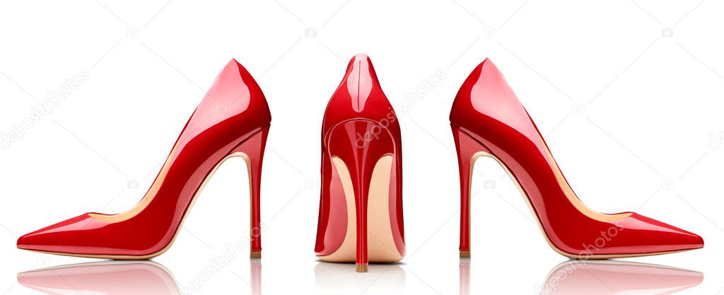 close up of red high heels on white background