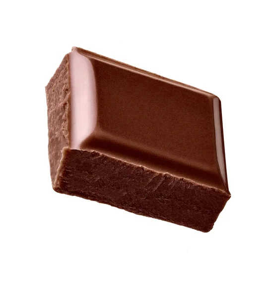 Primer Plano Trozos Chocolate Pila Cayendo Sobre Fondo Blanco — Foto de Stock