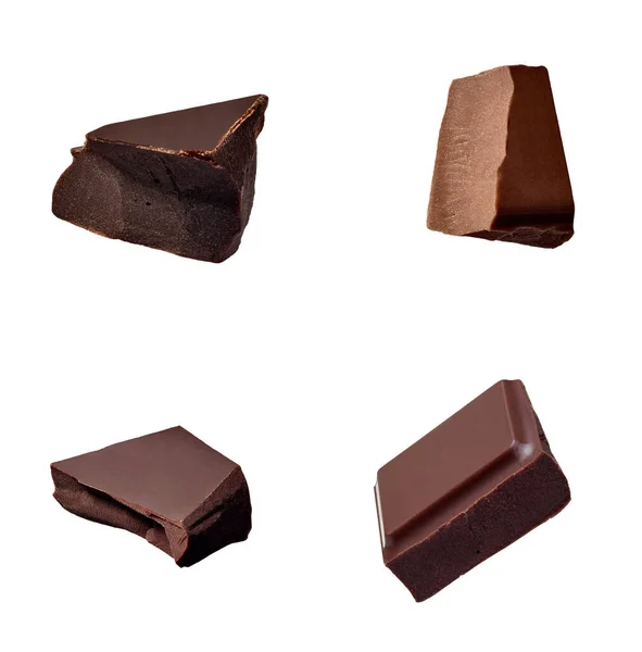 Närbild Choklad Bitar Faller Vit Bakgrund — Stockfoto