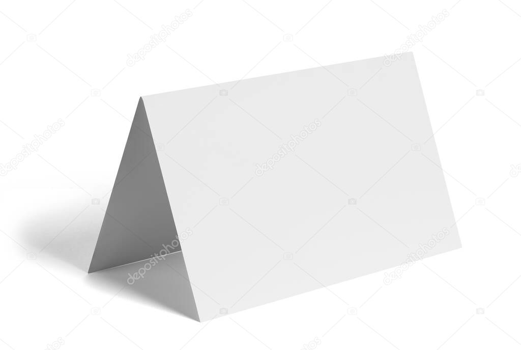 close up of a  blank folded leaflet or a desktop calendar white paper on white background 