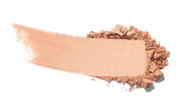 Beyaz arkaplanda yüz pudrasını kapat