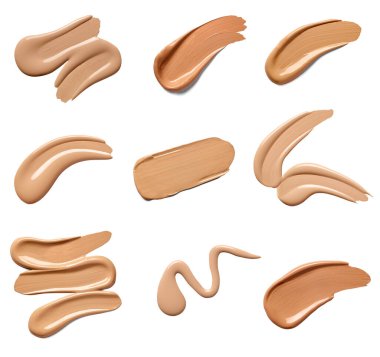 Güzellik sıvısı tozu koleksiyonu beyaz arka planda makyaj darbeleri. Her biri ayrı ayrı çekiliyor.