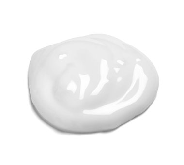 Beyaz arkaplandaki beyaz krema örneğini kapat