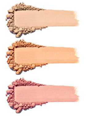 Beyaz arkaplanda yüz pudrasını kapat