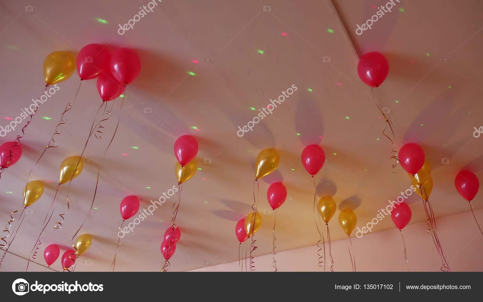 Red Balloons Yellow Hanging On Ceiling Of Holiday Stock Photo