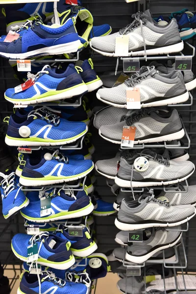 Sneakers in a sports shop on sale — Stock Photo, Image