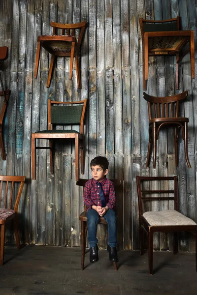 Menino Triste Camisa Quadriculada Sentado Cadeira — Fotografia de Stock