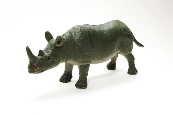 Brinquedo rinoceronte no fundo branco — Fotografia de Stock