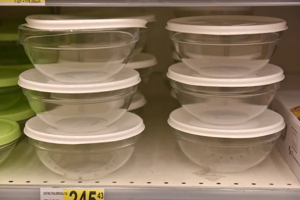 Plastic containers for food in the supermarket — Stock Photo, Image