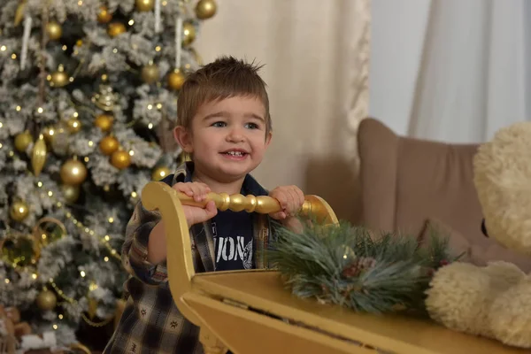 Boy in checkered shirt at christmas — Stock Photo, Image