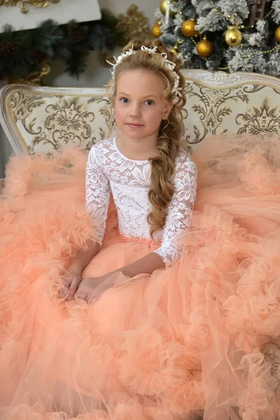 Portrait of a princess in a lush peach dress — Stock Photo, Image