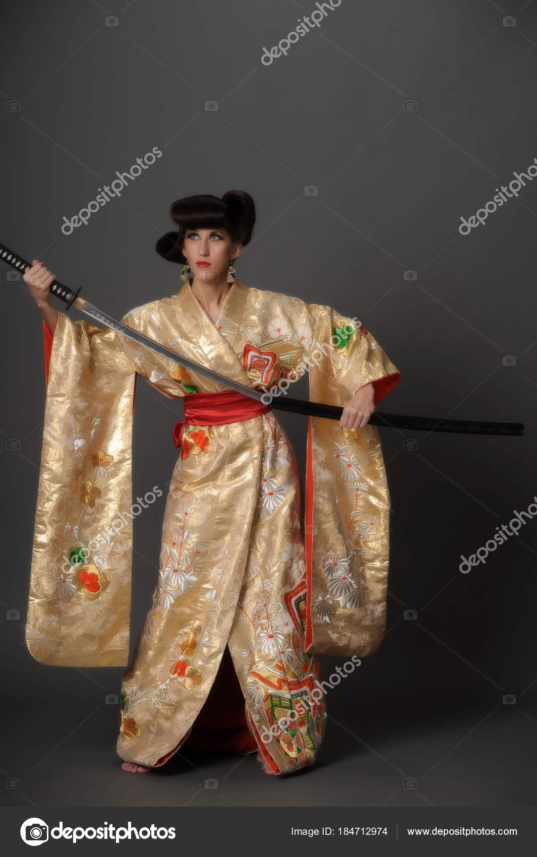 A woman in golden kimano Stock Photo by ©evdoha 184712974
