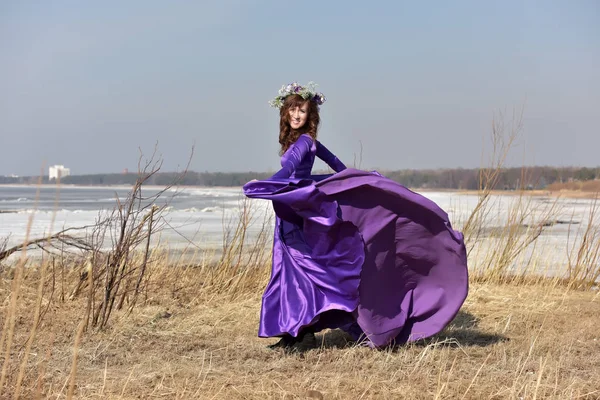 Woman flying lilac dress — Stock Photo, Image