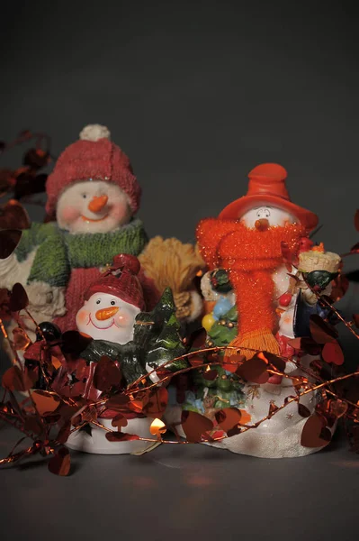 Toy snowmen in hats — Stockfoto