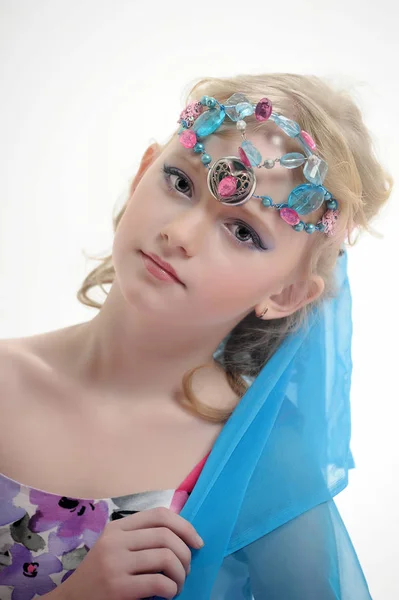 Young blonde princess with a beautiful oriental decoration on he — Stock Photo, Image