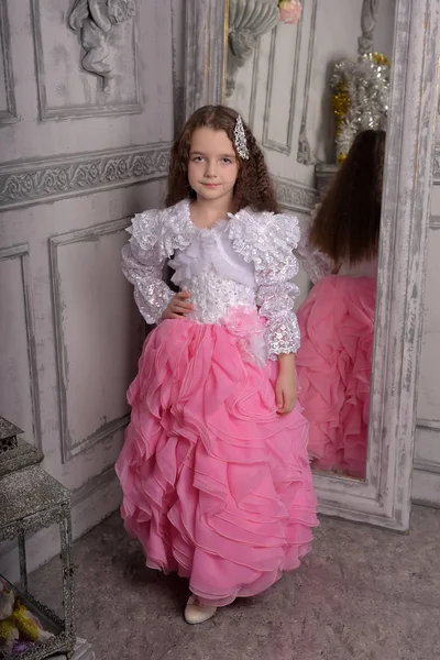 Smiling little girl in princess dress. — Stock Photo, Image