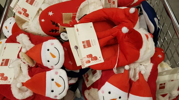 Funny Christmas slippers in the store — 스톡 사진