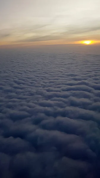 Sunset over the clouds, — Stock Photo, Image