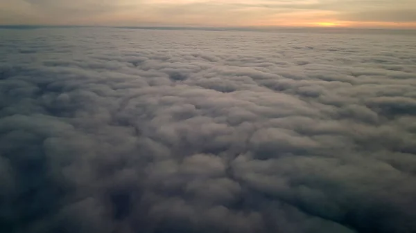 Закат над облаками, — стоковое фото